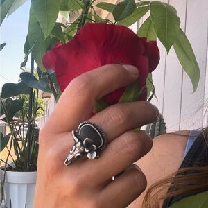 Hand made sterling silver, river stone. Beautiful and comfortable.